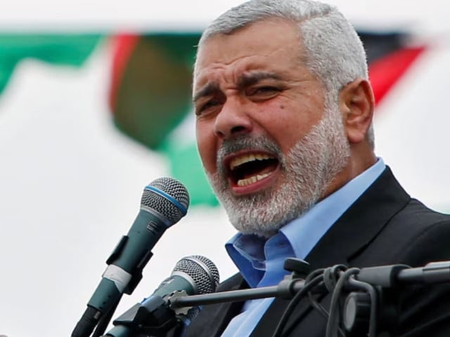 ismail haniyeh prime minister of the hamas gaza government talks to his supporters during a hamas rally marking the anniversary of the death of its leaders killed by israel in gaza city march 23 2014 photo reuters